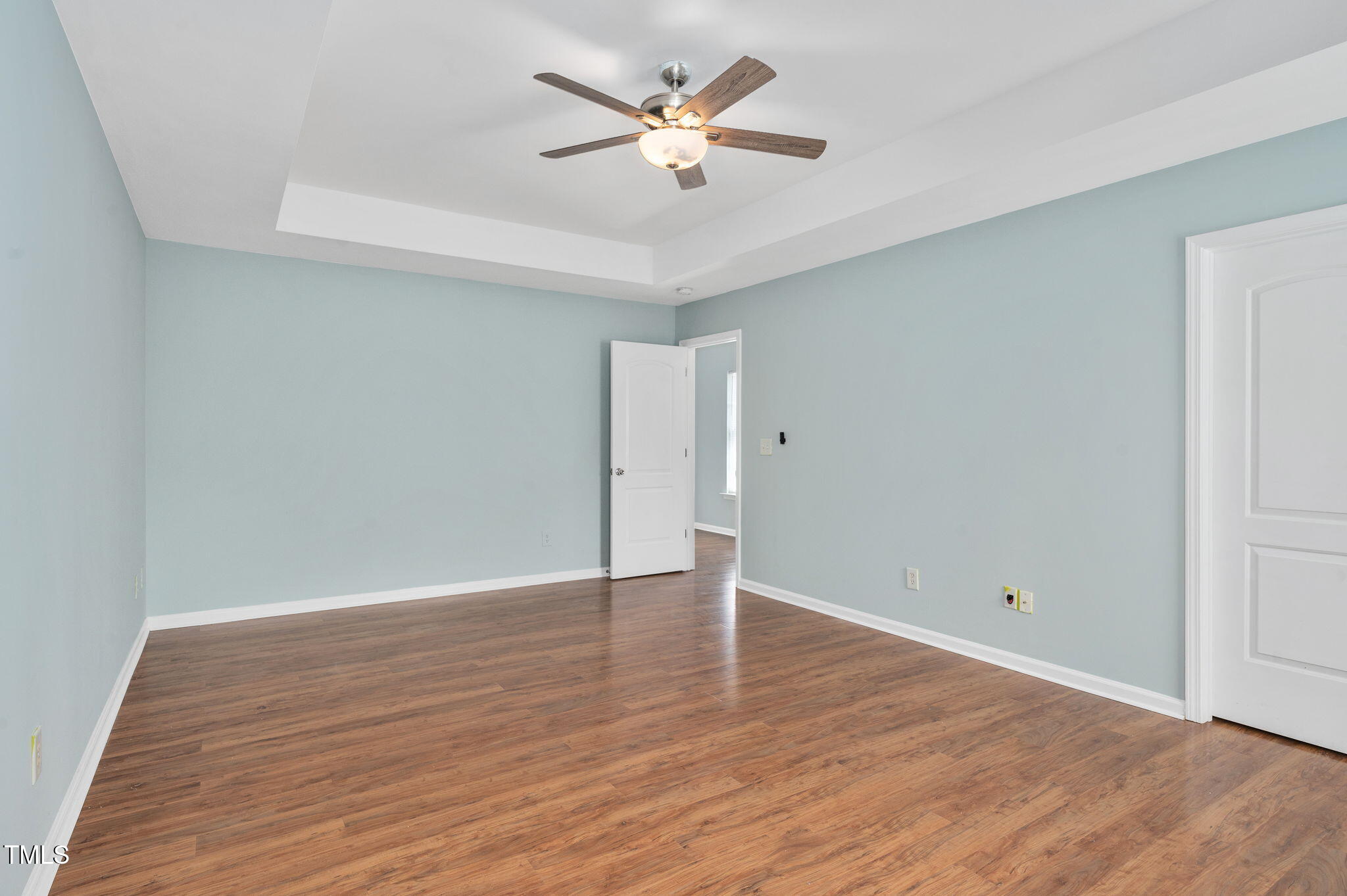 3805 Mike Levi Court Raleigh, NC 27610 - Photo 23 of 34 a view of an empty room with wooden floor