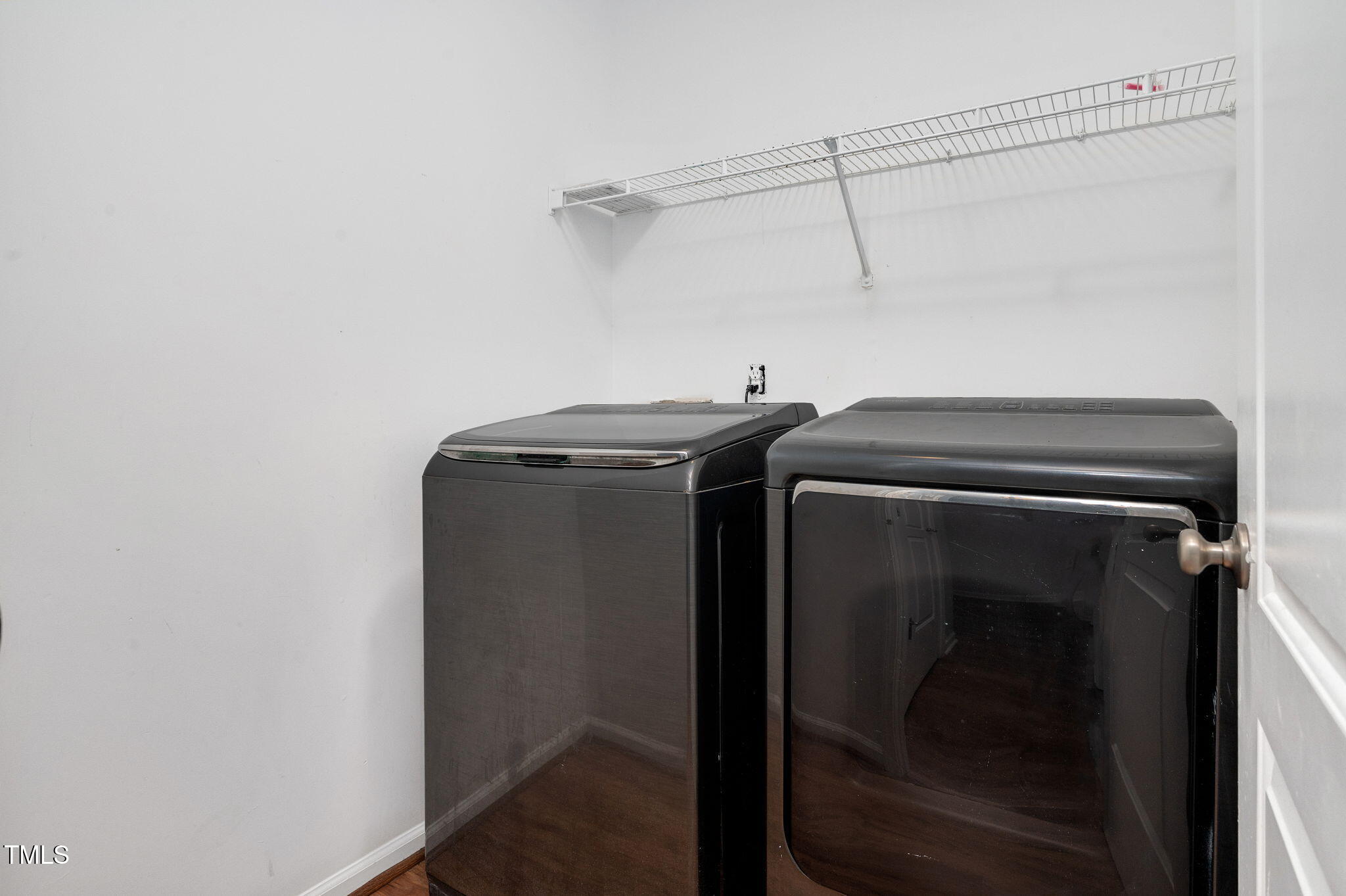 3805 Mike Levi Court Raleigh, NC 27610 - Photo 27 of 34 a utility room with dryer and washer