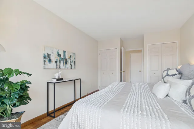 a bathroom with a sink a mirror and a bath tub