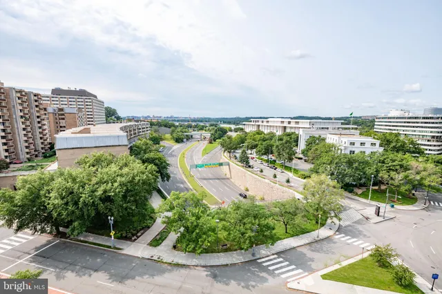 a view of a city with tall buildings in the background