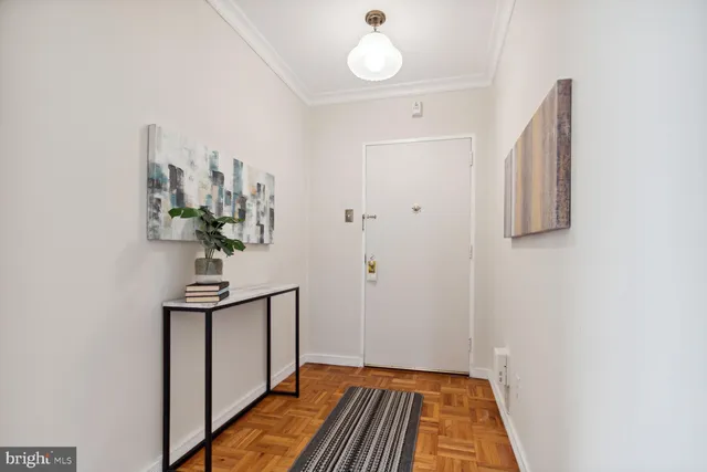 a view of a bathroom from a hallway