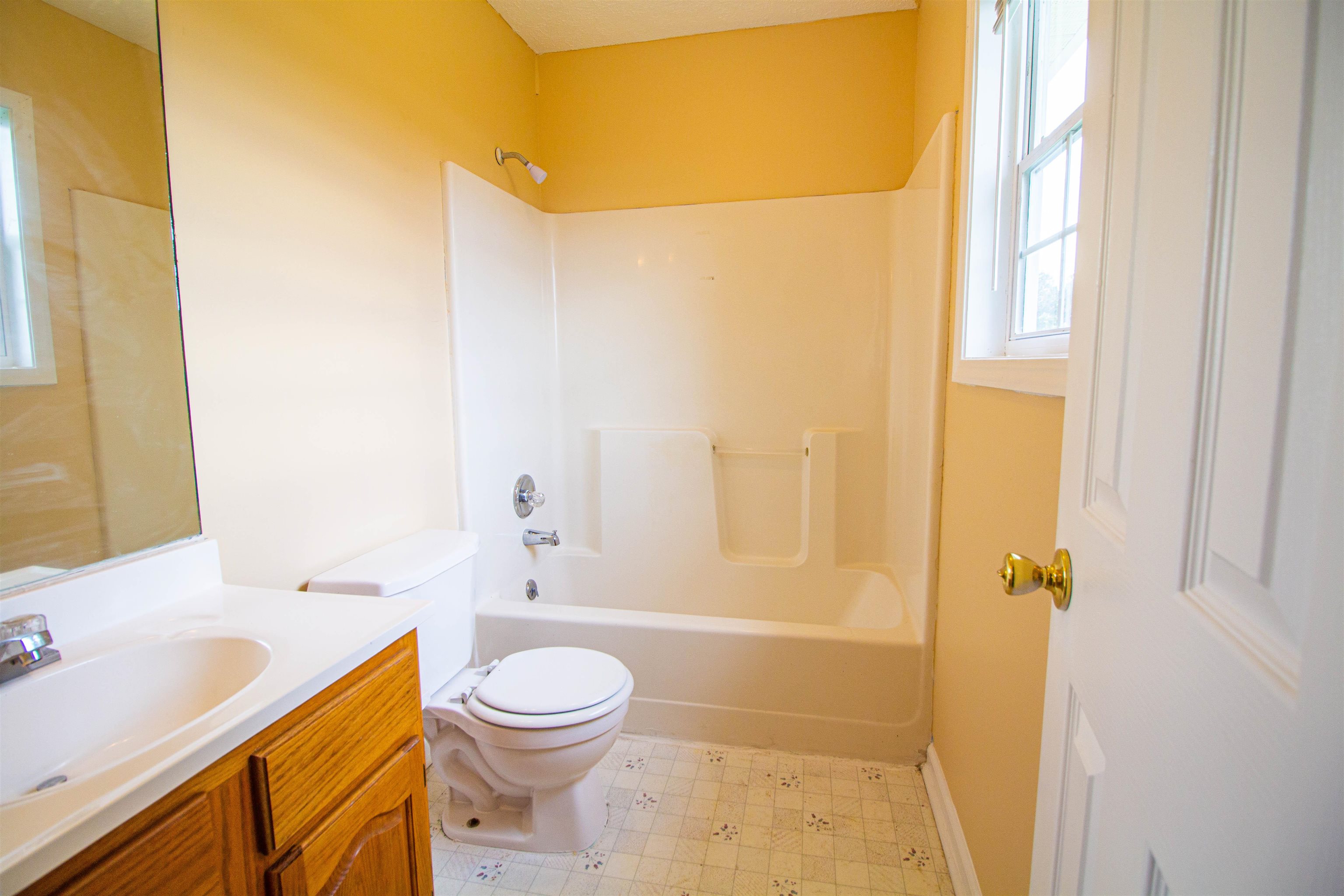 121 Kimberly Cove Ridgely, TN 38080 - Photo 17 of 22 a bathroom with a sink a toilet and shower