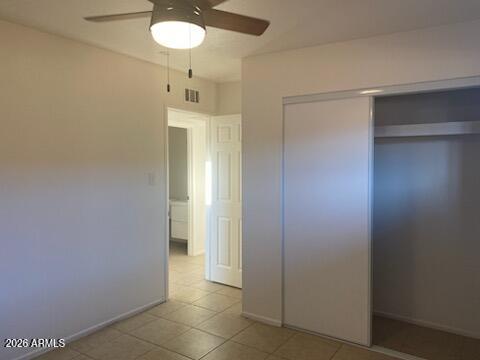 1224 South Smith Road Tempe, AZ 85281 - Photo 13 of 19 a bathroom with a sink and a mirror