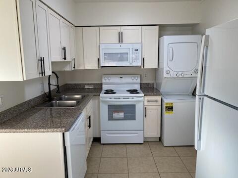 1224 South Smith Road Tempe, AZ 85281 - Photo 4 of 19 a kitchen with granite countertop a sink stove and refrigerator