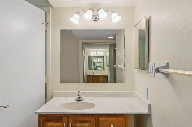 a bathroom with a toilet and a sink