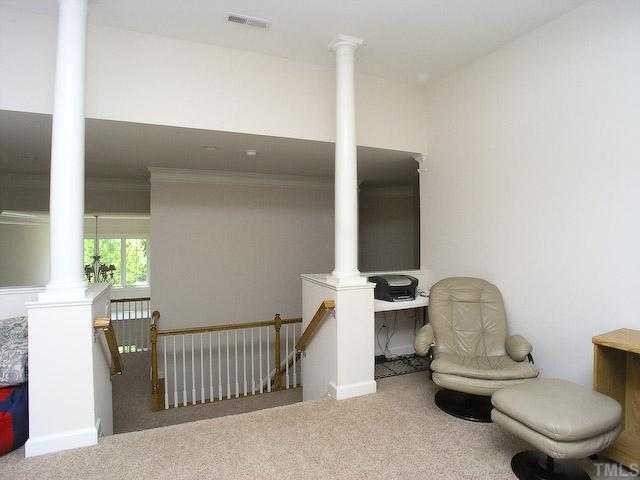12225 Dunard Street Raleigh, NC 27614 - Photo 10 of 12 a living room with furniture and a window