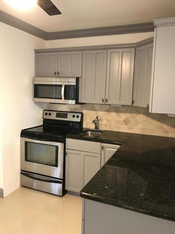 1172 Surf Road, Unit A1 Singer Island, FL 33404 - Photo 5 of 11 kitchen