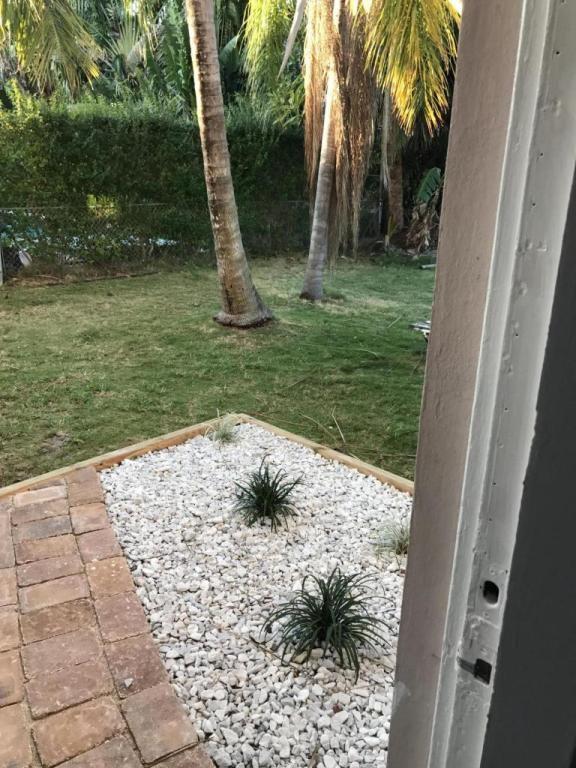 1172 Surf Road, Unit A1 Singer Island, FL 33404 - Photo 9 of 11 back yard