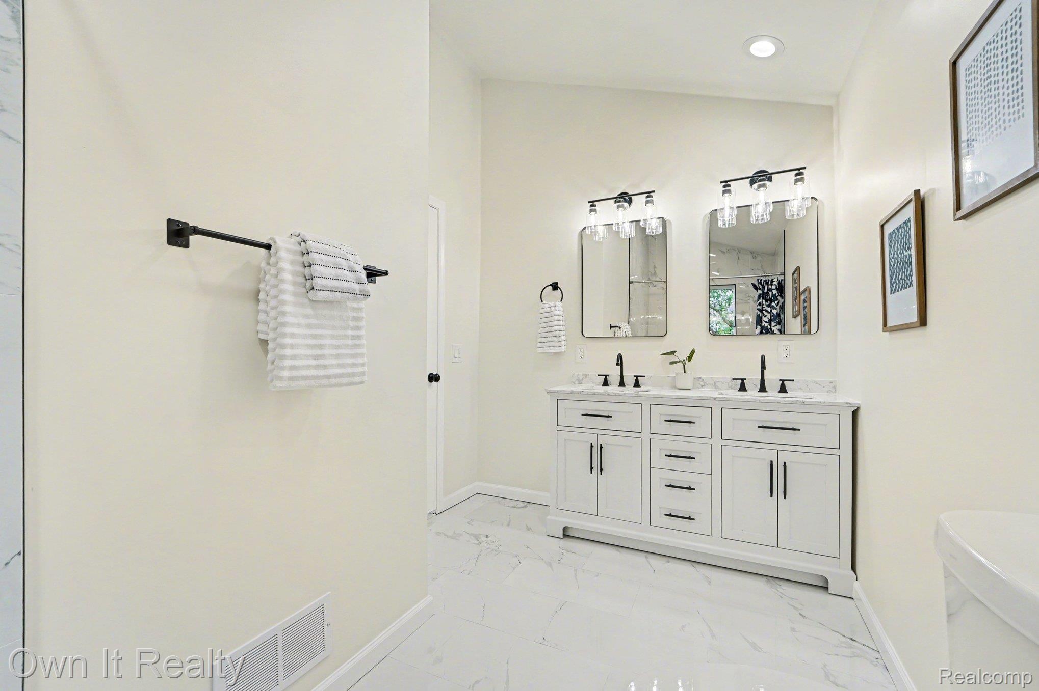 168 Kerby Road Grosse Pointe, MI 48236 - Photo 23 of 36 Full bathroom with light marble finish floors, double vanity, and recessed lighting