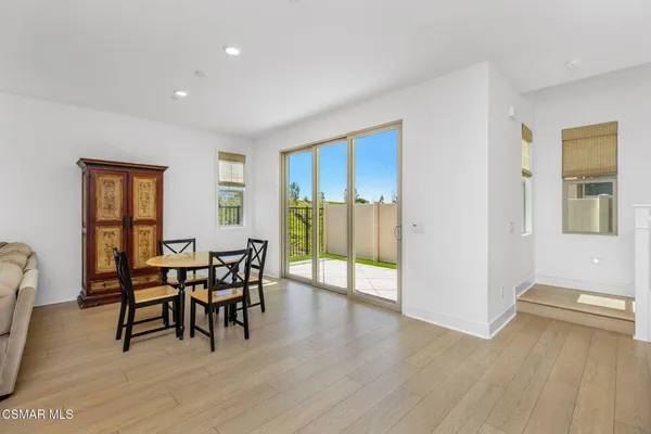 a view of a livingroom with furniture and wooden floor