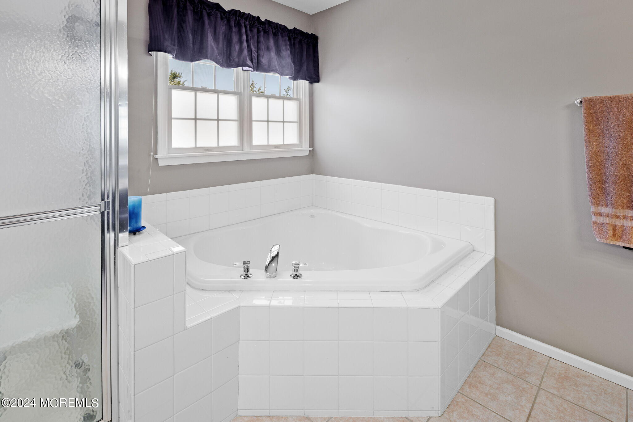 152 Seaspray Road Manahawkin, NJ 08050 - Photo 50 of 67 a bathroom with a bathtub and a window