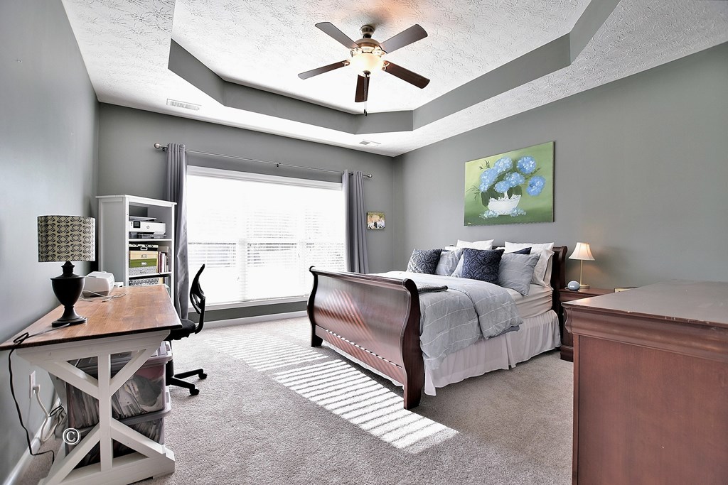 4678 Ivy Patch Drive Fortson, GA 31808 - Photo 11 of 28 a bedroom with furniture and a window