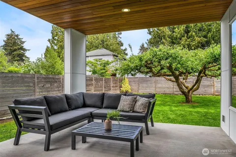 a outdoor living space with furniture and garden