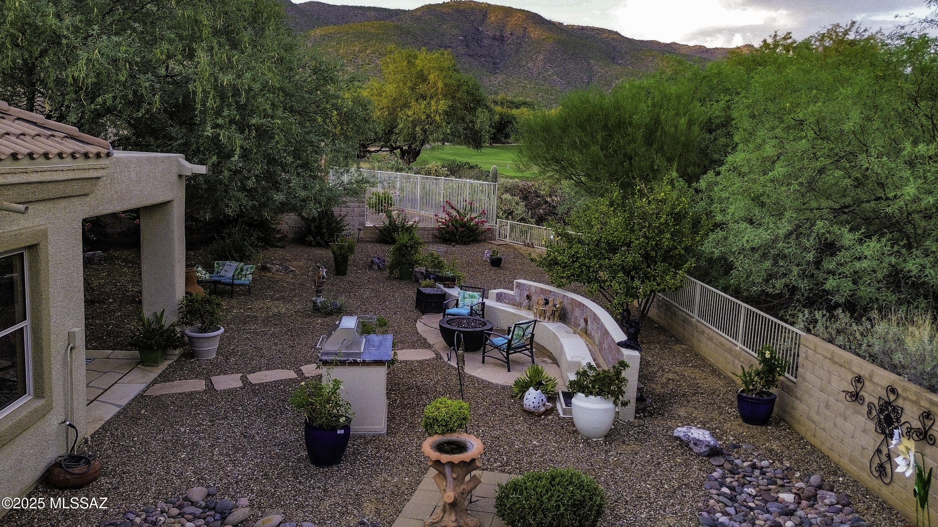 5202 Spring View Drive Tucson, AZ 85749 - Photo 37 of 49 a view of yard with an outdoor seating