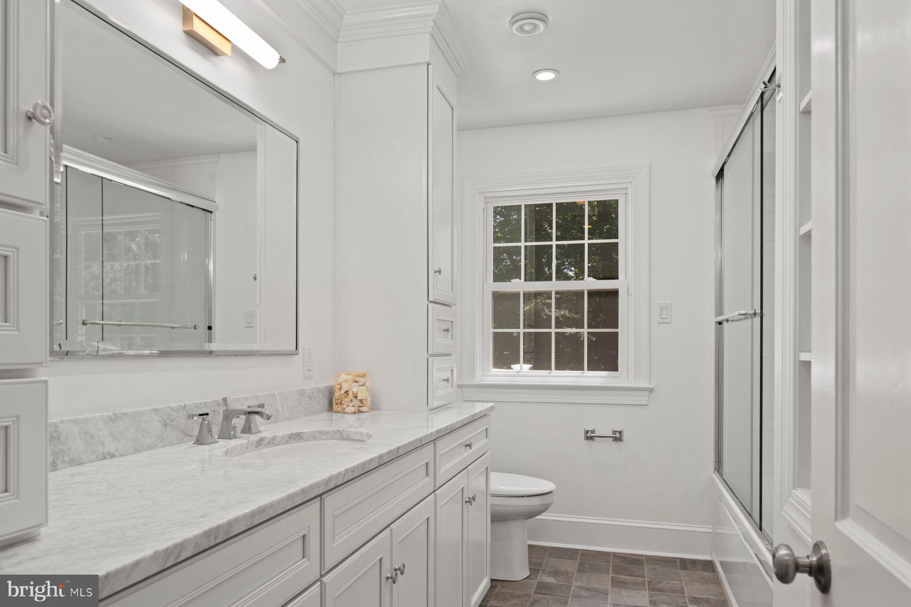 241 Line Road Malvern, PA 19355 - Photo 22 of 33 a bathroom with a granite countertop sink toilet and shower