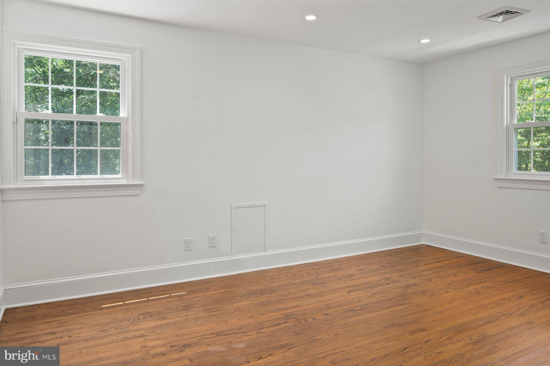 241 Line Road Malvern, PA 19355 - Photo 24 of 33 an empty room with wooden floor and windows