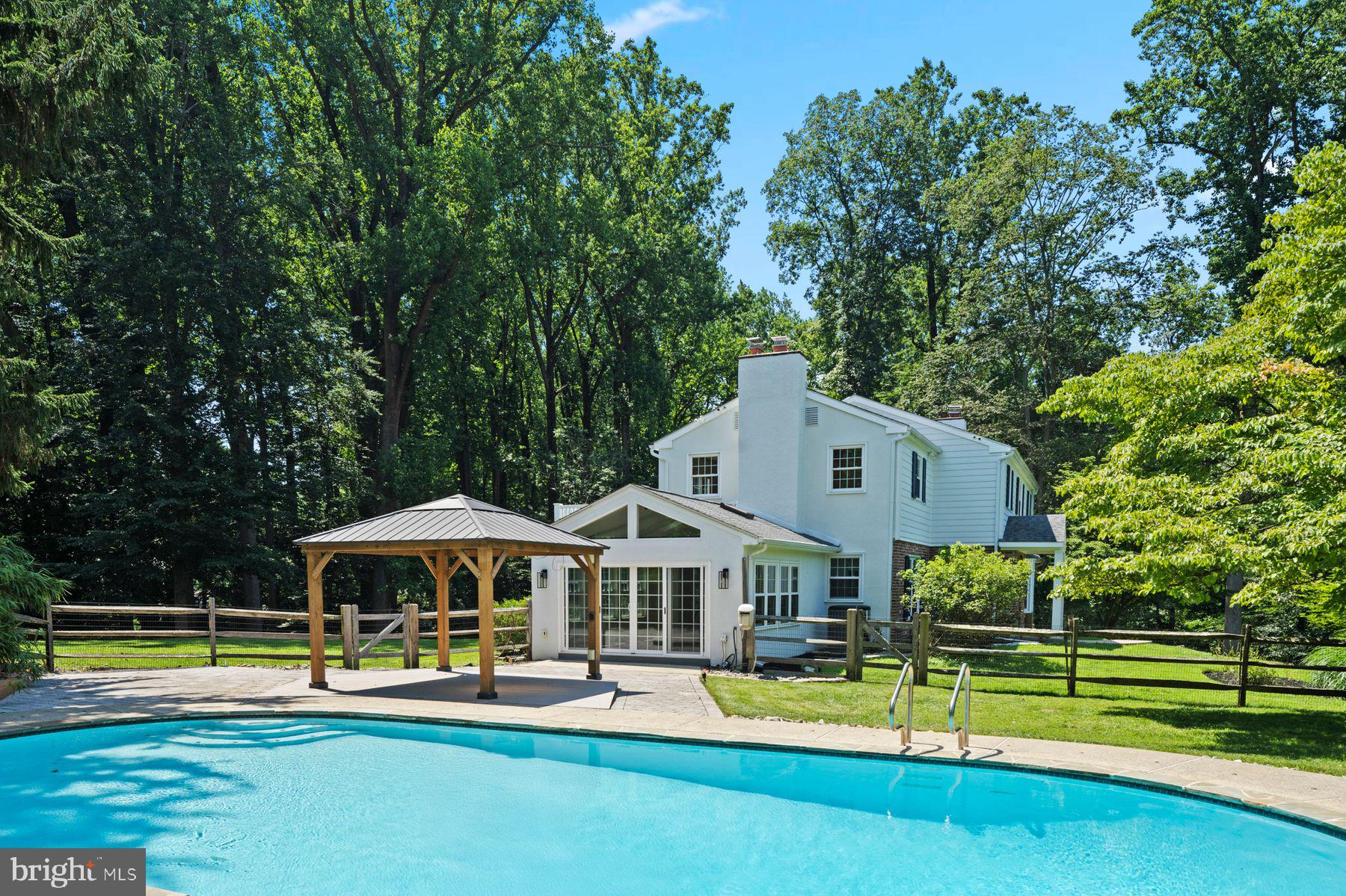 241 Line Road Malvern, PA 19355 - Photo 30 of 33 a front view of a house with swimming pool and porch