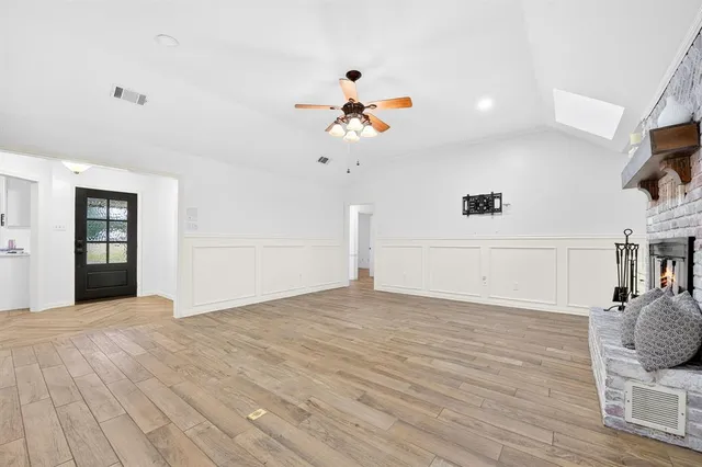 a view of workspace with wooden floor