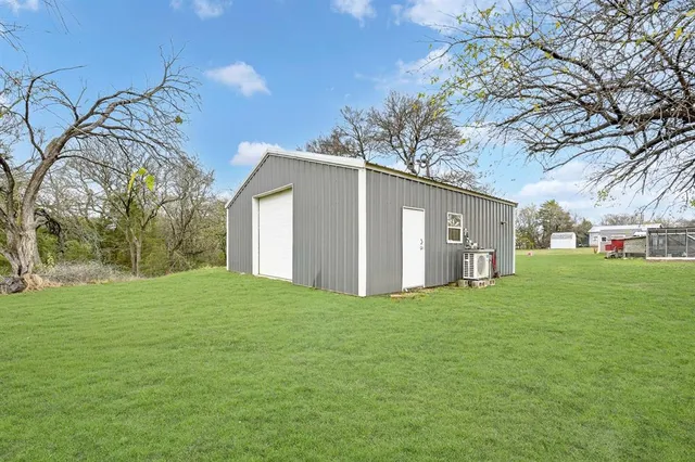a house view with a garden space