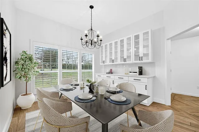 a view of a dining room with furniture window and outside view