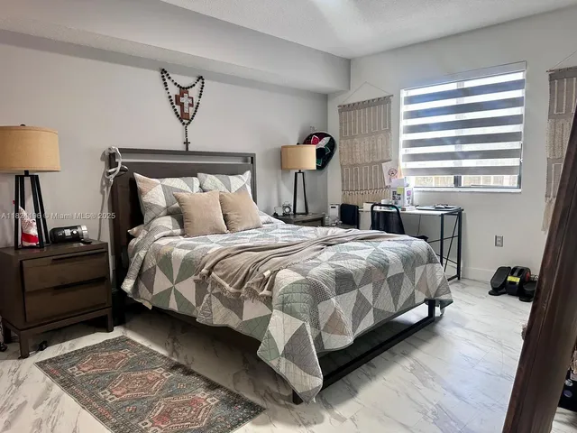 $379,900 | 9340 Fontainebleau Boulevard, Unit 313, Miami, FL 33172