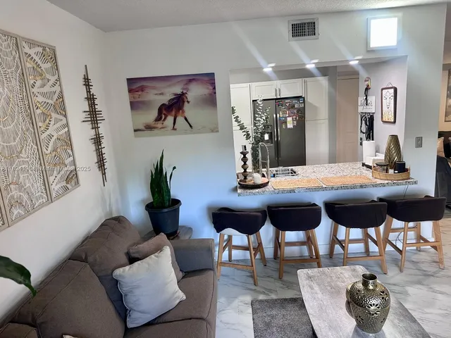 $379,900 | 9340 Fontainebleau Boulevard, Unit 313, Miami, FL 33172