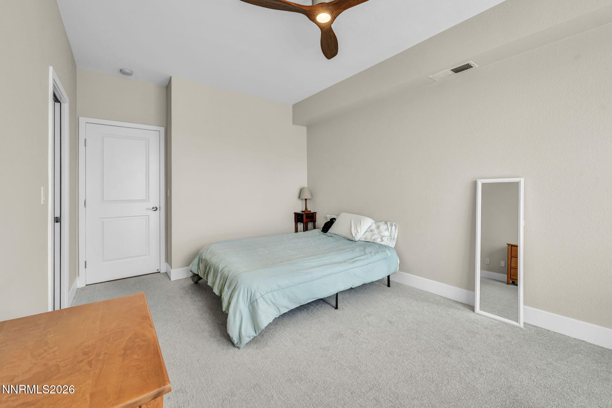 326 State Street Reno, NV 89501 - Photo 30 of 49 a bedroom with a bed and painting on the wall