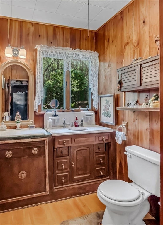 32 Pond Hill Road Goshen, MA 01096 - Photo 12 of 24 a bathroom with a granite countertop toilet sink and mirror
