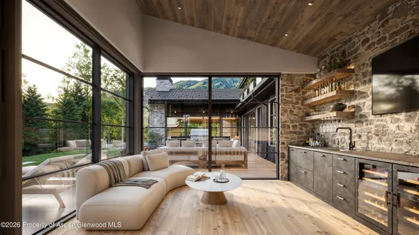 a living room with fireplace furniture and a flat screen tv