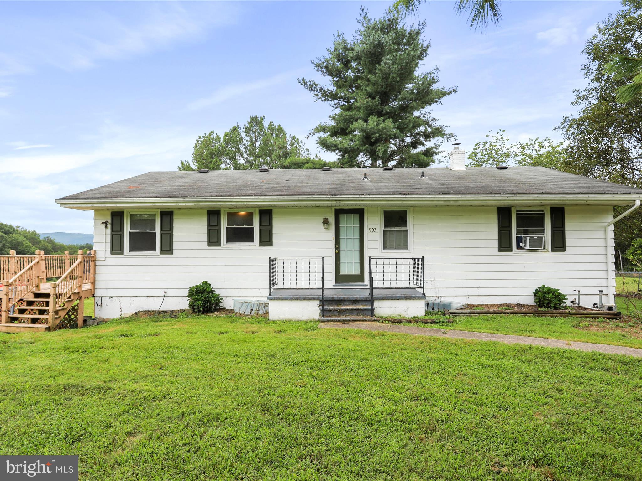 903 Coverstone Road Fort Valley, VA 22652 - Photo 6 of 75 a front view of house with yard