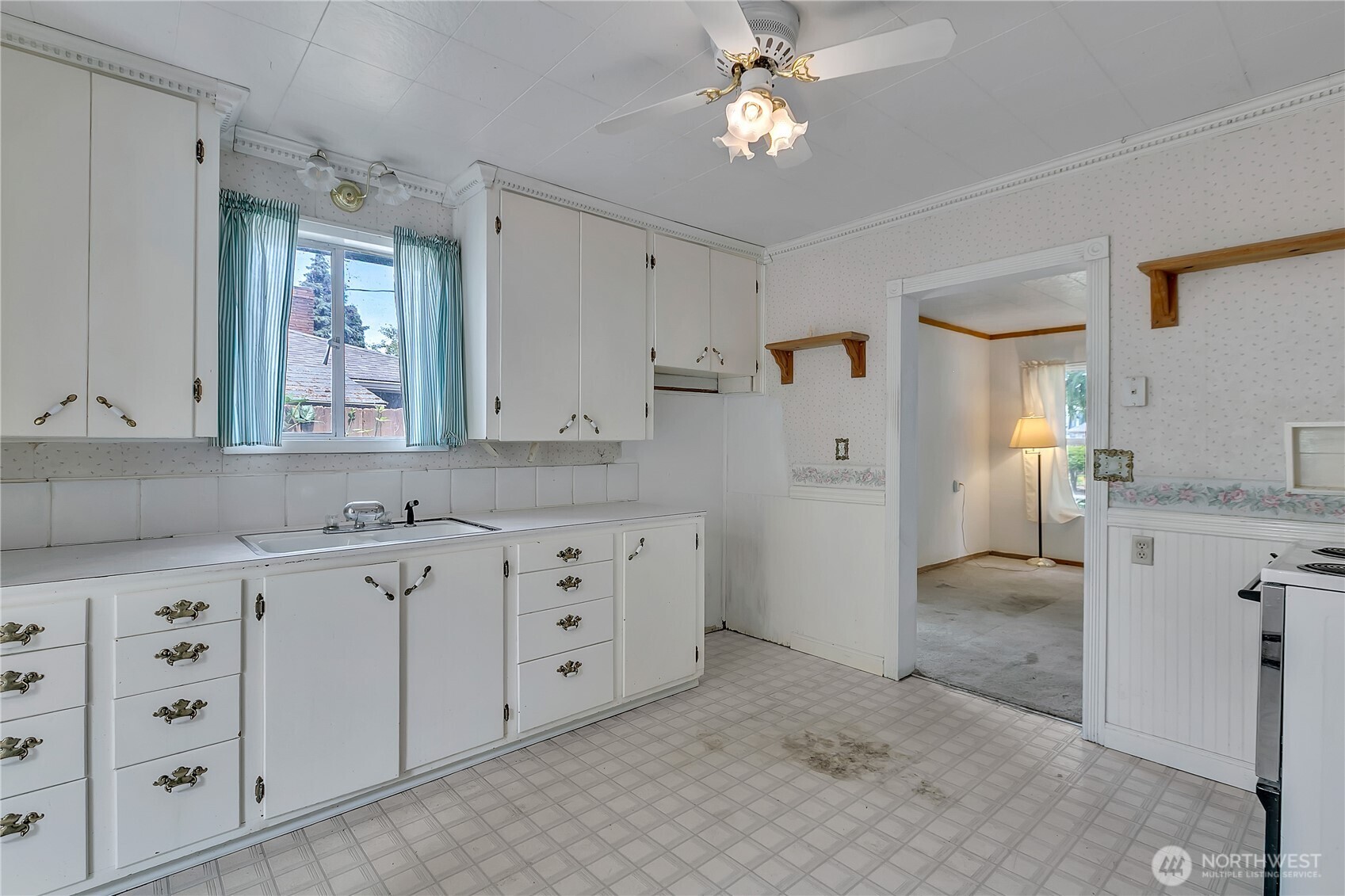 2209 Talbot Road South Renton, WA 98055 - Photo 2 of 8 a spacious bathroom with a granite countertop sink mirror and a