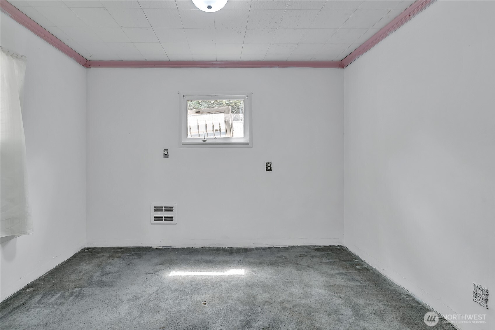 2209 Talbot Road South Renton, WA 98055 - Photo 5 of 8 an empty room with a window
