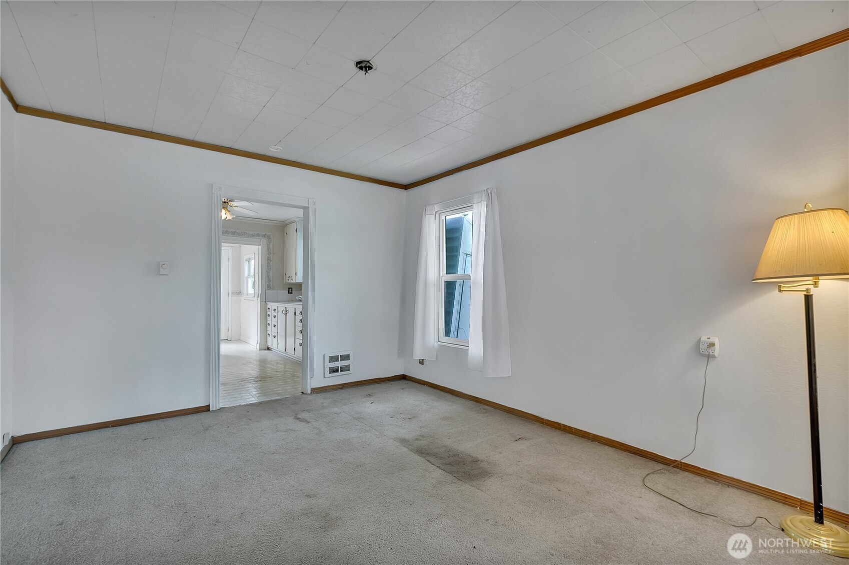 2209 Talbot Road South Renton, WA 98055 - Photo 8 of 8 a view of an empty room with a window