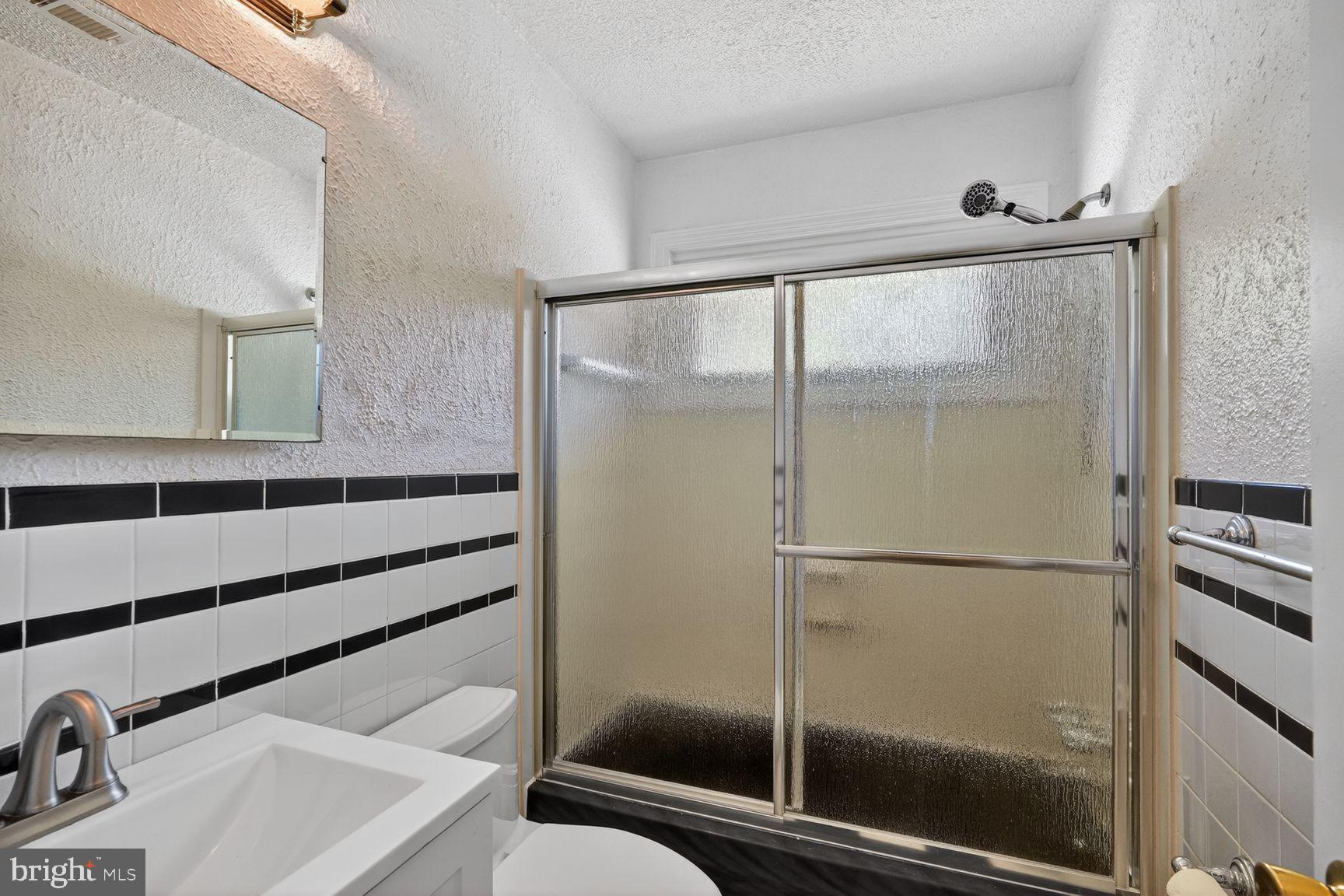 4202 Yates Road Beltsville, MD 20705 - Photo 16 of 31 Modern bathroom with sleek finishes.