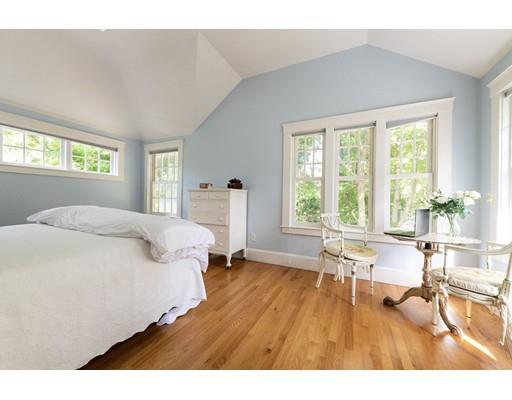 15 Tappan Road Wellesley, MA 02482 - Photo 13 of 18 a spacious bedroom with a bed and a large window