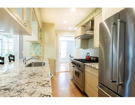15 Tappan Road Wellesley, MA 02482 - Photo 8 of 18 a kitchen with stainless steel appliances granite countertop a refrigerator a stove and a sink