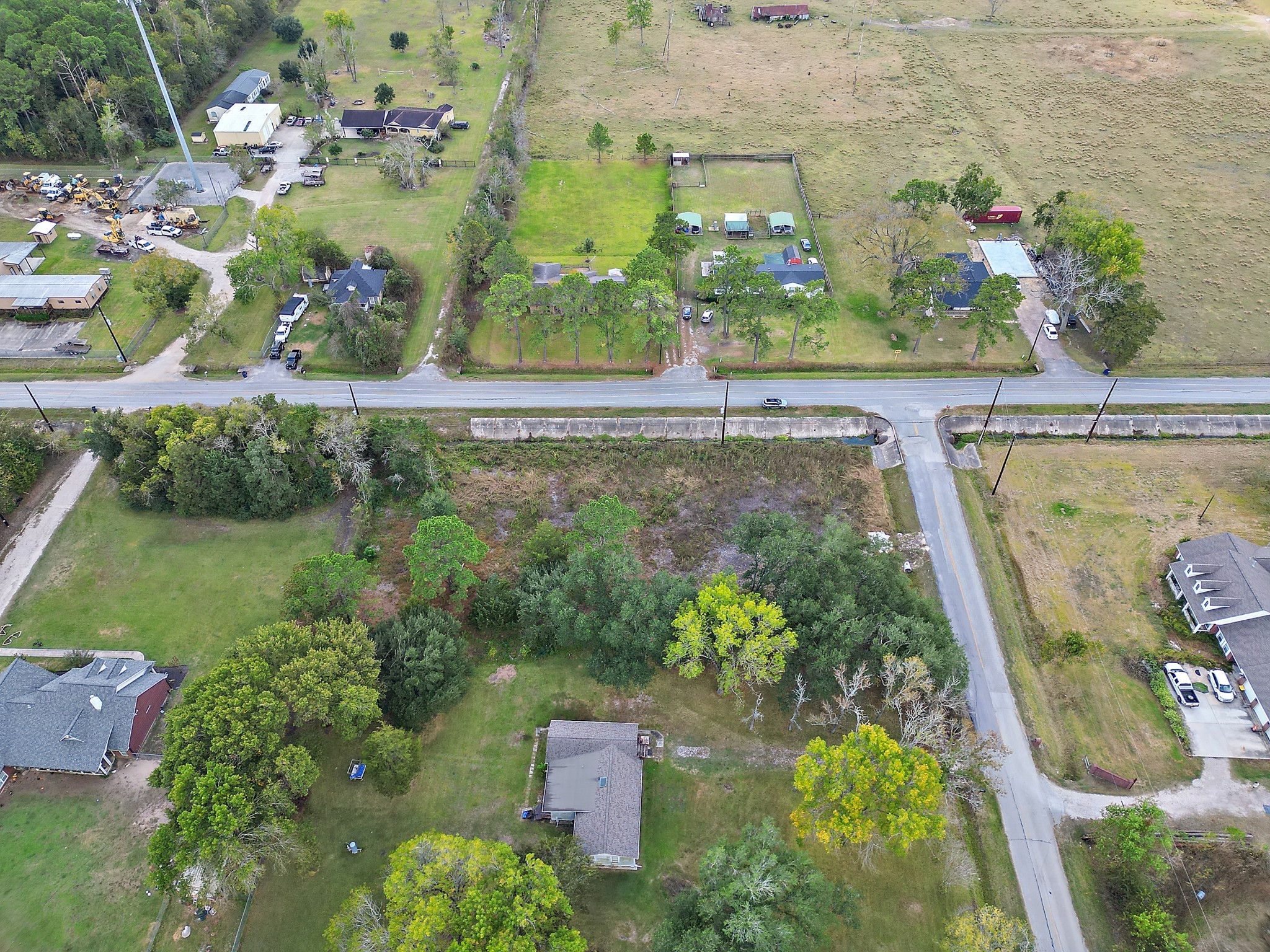 0 North Gum Gully School Road Crosby, TX 77532 - Photo 12 of 15 an aerial view of a house with a yard and lake view