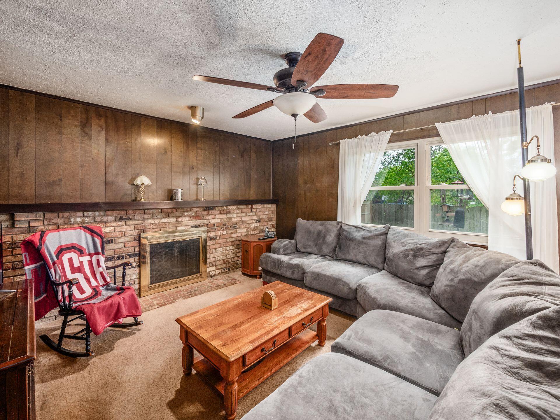 1891 Fairhaven Road Columbus, OH 43229 - Photo 21 of 36 Fireplace in family room has a gas starter and brick hearth!
