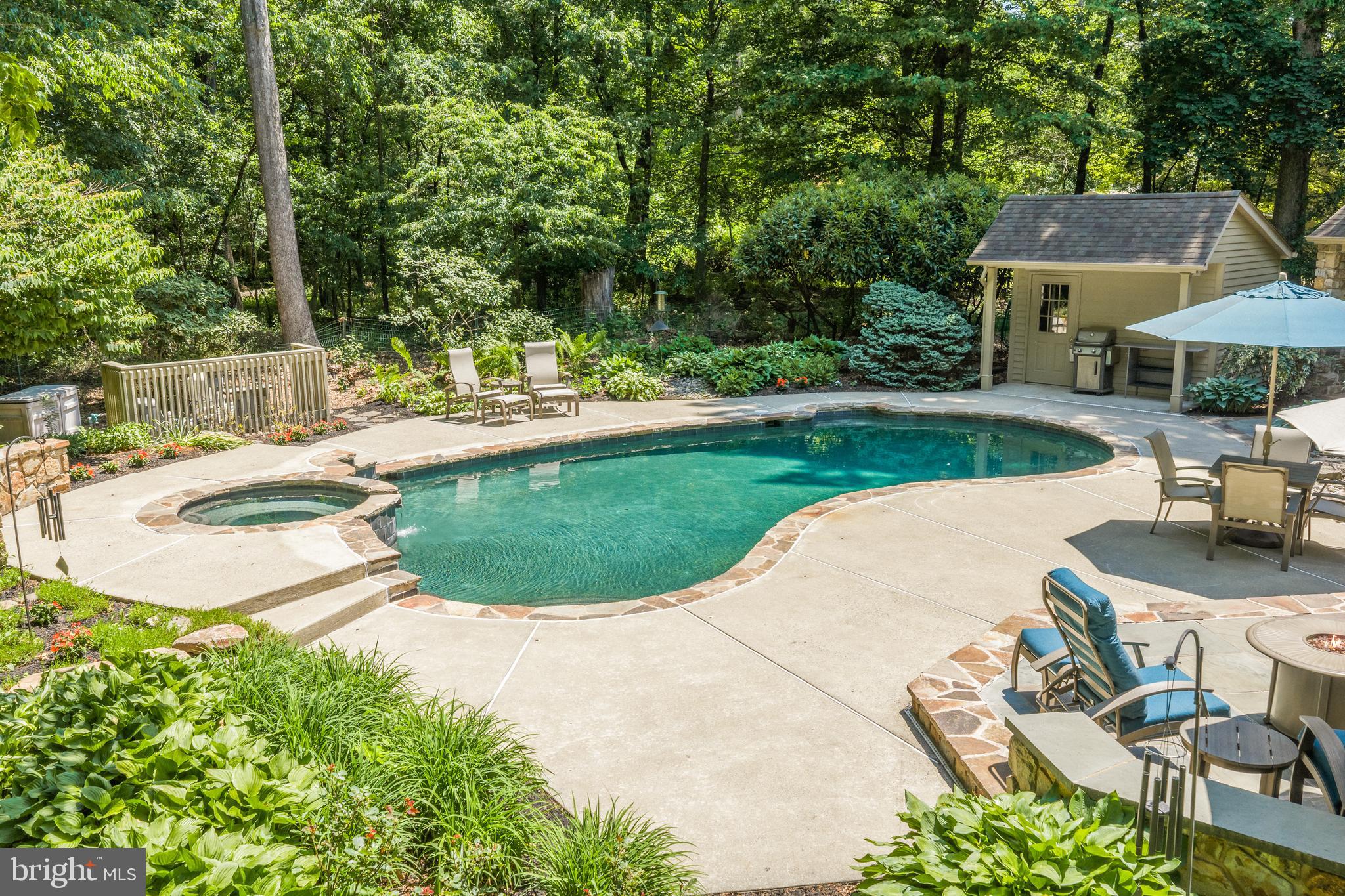 155 Barton Drive Spring City, PA 19475 - Photo 45 of 65 In-ground pool w/ cascading waterfall