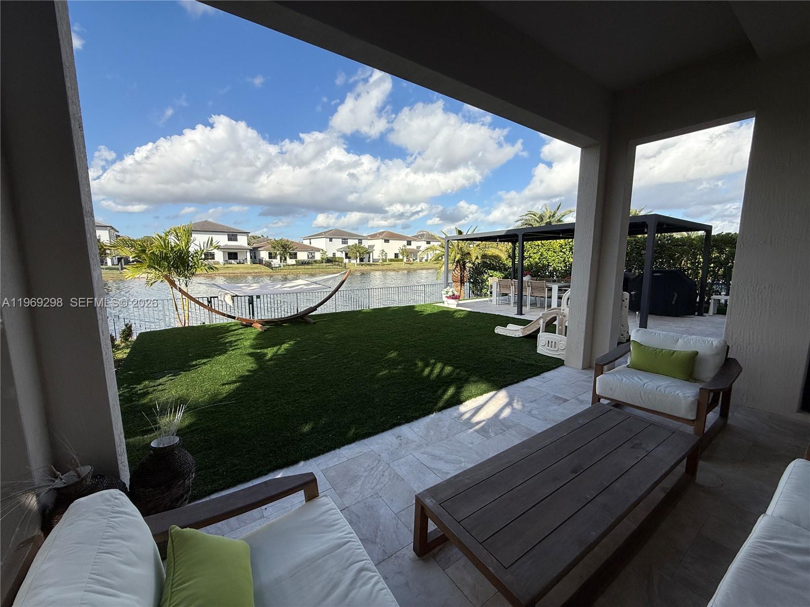 17507 Southwest 43rd Street Miramar, FL 33029 - Photo 1 of 25 a view of a chairs and table in patio
