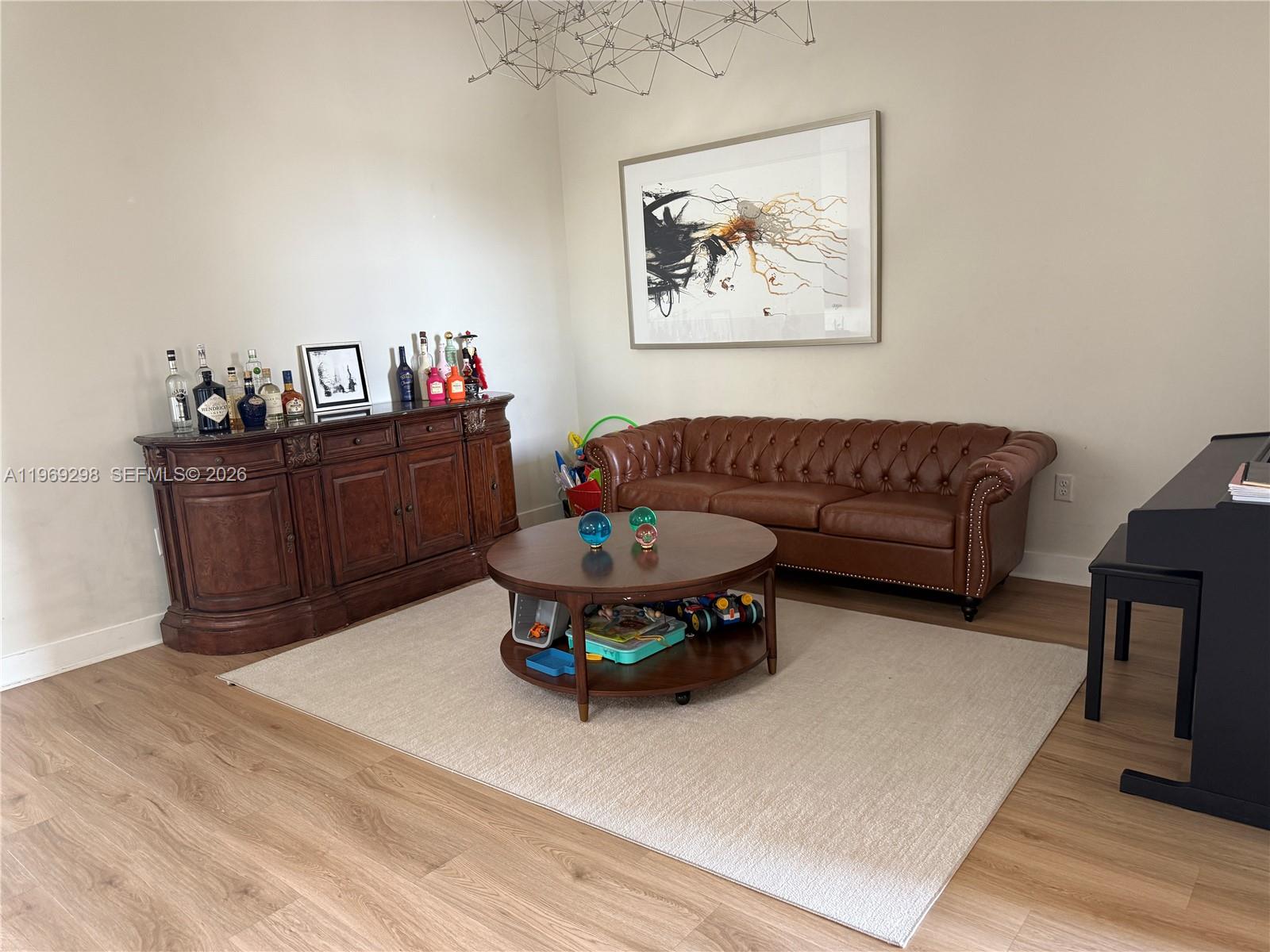 17507 Southwest 43rd Street Miramar, FL 33029 - Photo 11 of 25 a living room with furniture and a dining table