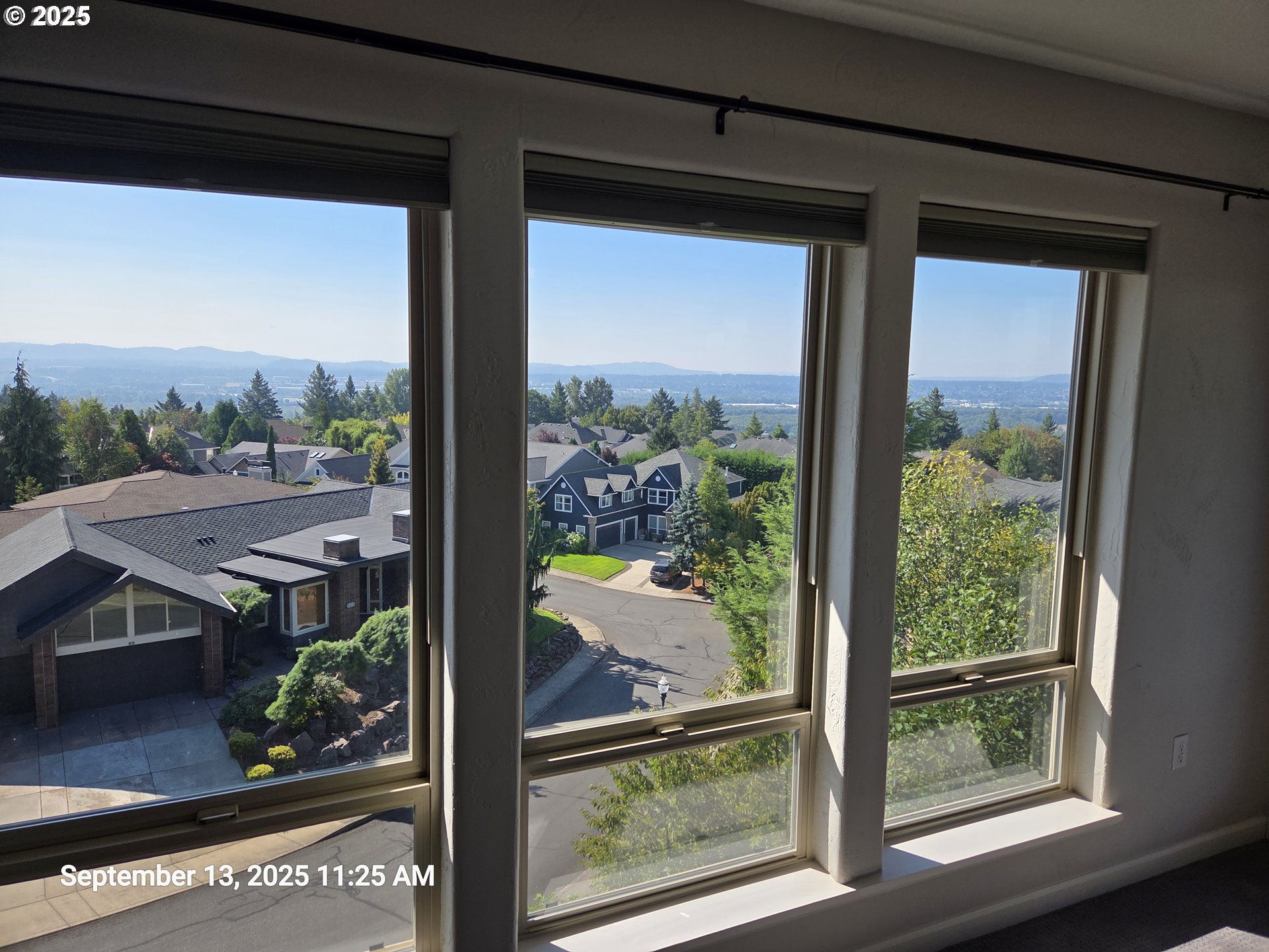 4907 Northwest Highpoint Drive Camas, WA 98607 - Photo 17 of 48 a view of a balcony with potted plants