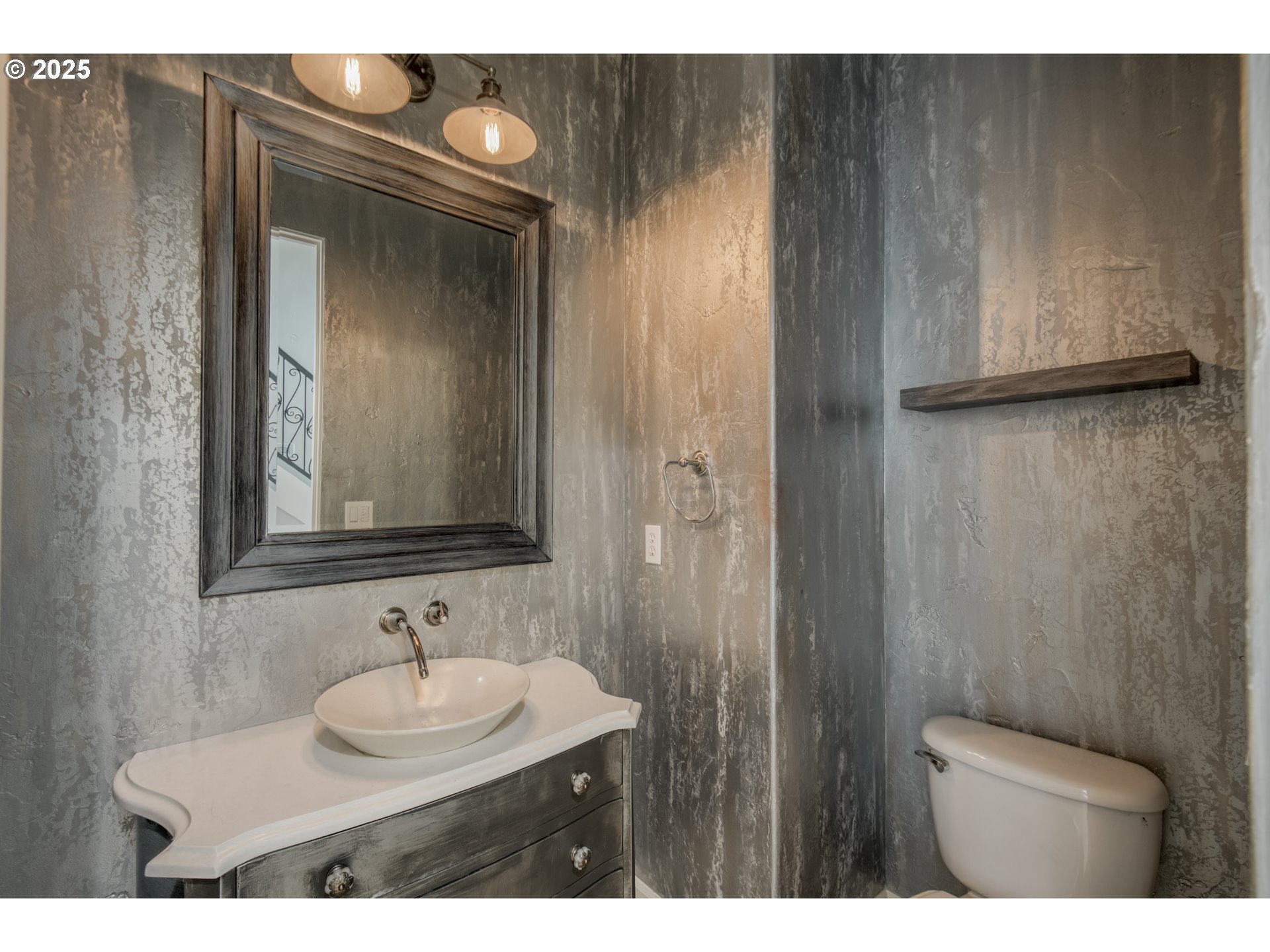 4907 Northwest Highpoint Drive Camas, WA 98607 - Photo 19 of 48 a bathroom with a sink and a mirror