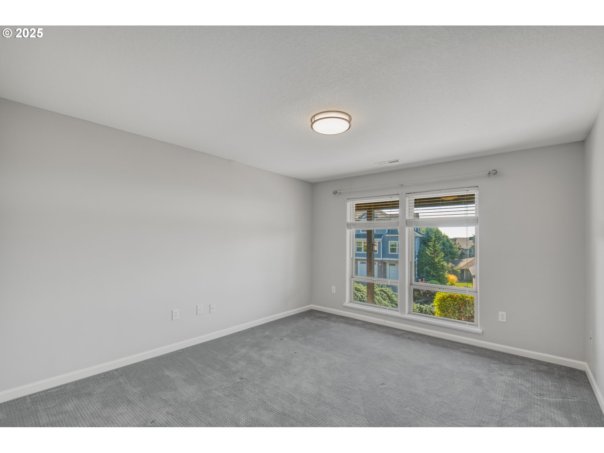 4907 Northwest Highpoint Drive Camas, WA 98607 - Photo 37 of 48 a view of an empty room with a window