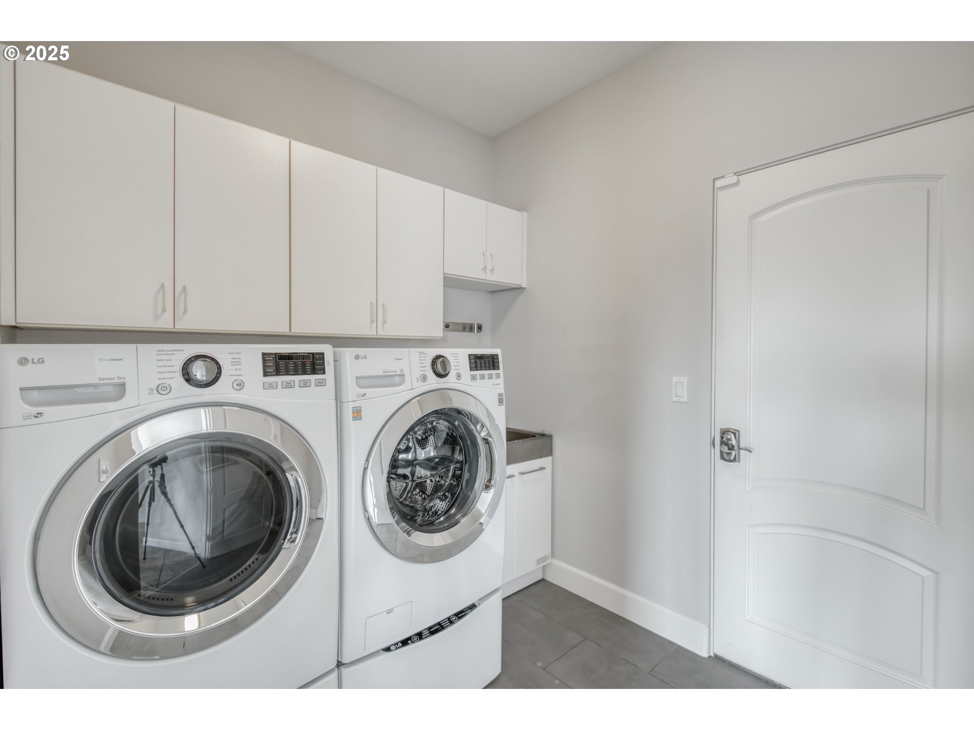 4907 Northwest Highpoint Drive Camas, WA 98607 - Photo 39 of 48 a utility room with dryer and washer
