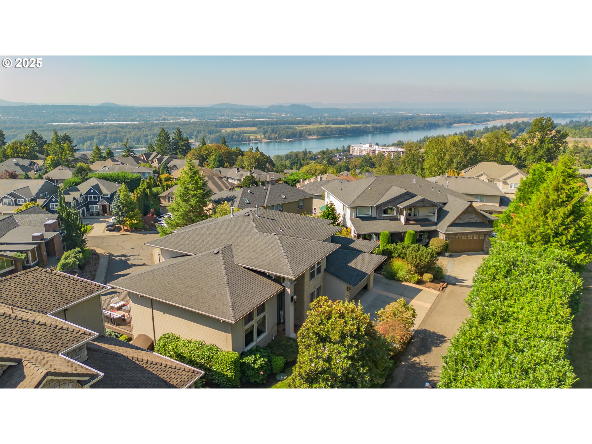 4907 Northwest Highpoint Drive Camas, WA 98607 - Photo 4 of 48 a view of a city with an ocean view