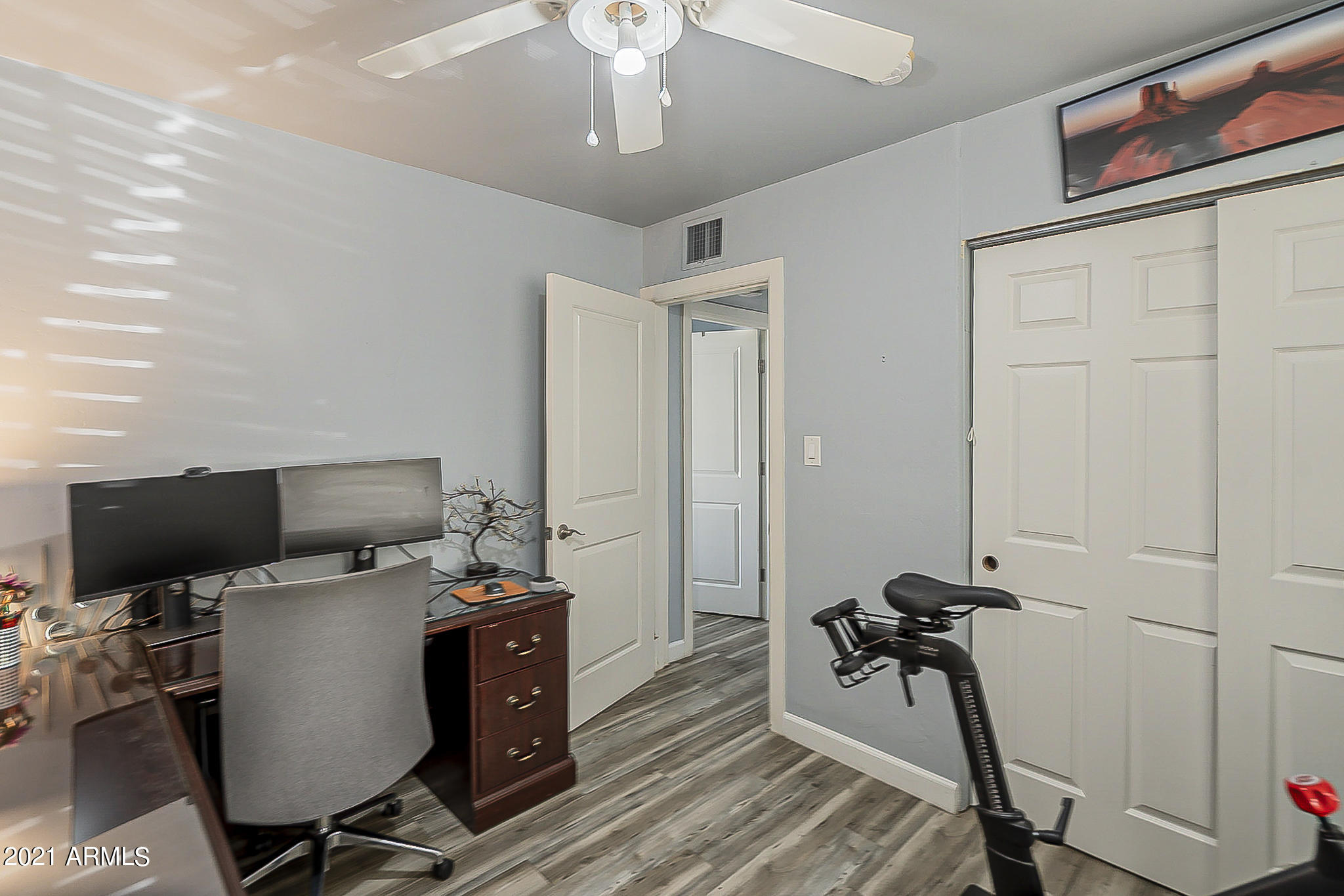 1802 East Cheery Lynn Road Phoenix, AZ 85016 - Photo 15 of 29 a view of a workspace with furniture and gym equipment