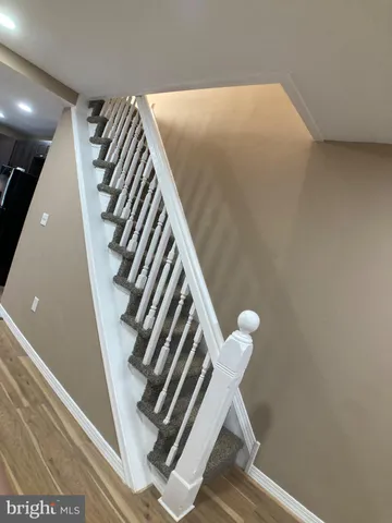 wooden floor in a hall with wooden floor