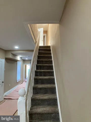 a bathroom with a shower and a toilet