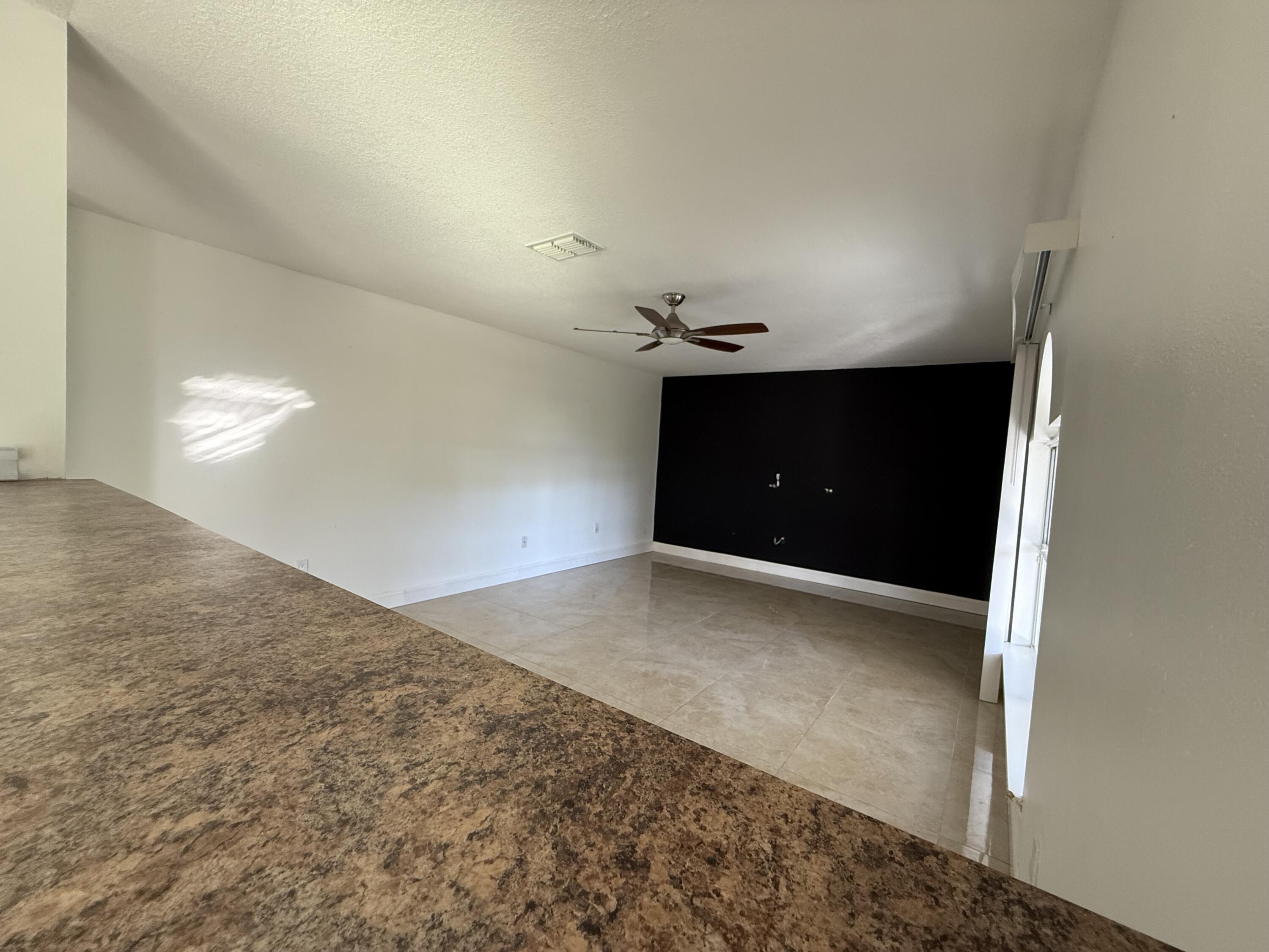 1925 Southwest Libra Lane Port St. Lucie, FL 34984 - Photo 18 of 49 a view of a room with a space
